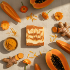 Aurea soap overhead flat lay with papaya turmeric and marigold flowers