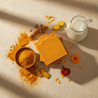 Sinag soap overhead flat lay with turmeric root marigold and goat milk jug