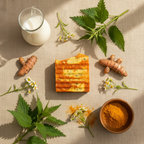 Verdelle soap overhead flat lay with nettle leaves turmeric and goat milk jug