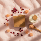 Himalayan salt soap overhead flat lay with pink salt crystals rose petals and goat milk