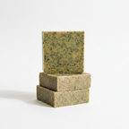 Three Emerald Oat soap bars on white background studio shot