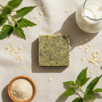 Emerald Oat soap overhead flat lay with oats nettle and goat milk jug