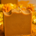 Sinag soap close-up macro showing vibrant golden turmeric texture
