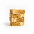 Mabrielle Sinag Pure Turmeric and Goat Milk Artisan Soap bars stacked on white background studio shot